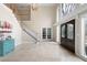 Grand foyer featuring high ceilings, a staircase, and decorative front doors at 1850 Kirkmont Nw Dr, Marietta, GA 30064