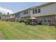 Spacious backyard with a patio area, perfect for outdoor relaxation and entertainment in a lush, green setting at 1969 Lanier Harbor Pt, Buford, GA 30518