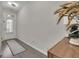 Inviting foyer with wood-look flooring, natural light, and elegant decor at 1969 Lanier Harbor Pt, Buford, GA 30518