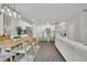 Open-concept layout with dining area and kitchen, perfect for entertaining guests at 1969 Lanier Harbor Pt, Buford, GA 30518