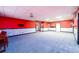 Expansive basement area with neutral carpet, offering versatile space for entertainment and recreation at 7090 Valley Landing Ct, Cumming, GA 30041