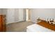 Neutral bedroom with plush carpet and natural lighting through the windows at 7090 Valley Landing Ct, Cumming, GA 30041