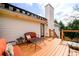 Inviting deck featuring comfortable seating, ideal for outdoor relaxation and entertaining with a view at 7090 Valley Landing Ct, Cumming, GA 30041