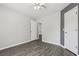 Bedroom featuring hardwood floors, neutral paint, and a closet at 2379 Fallbrook Ct, Duluth, GA 30096