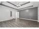 Large bedroom showcasing hardwood floors and neutral colors at 2379 Fallbrook Ct, Duluth, GA 30096