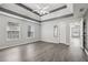Light filled bedroom featuring hardwood floors and abundant natural light at 2379 Fallbrook Ct, Duluth, GA 30096