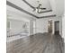 Spacious hallway featuring hardwood floors and neutral paint at 2379 Fallbrook Ct, Duluth, GA 30096