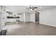 Open-concept living space featuring laminate floors and a seamless flow into the kitchen area at 2379 Fallbrook Ct, Duluth, GA 30096