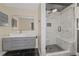 Bathroom featuring black floors, marble-tiled shower, vanity and a vessel sink at 2680 Pine Tree Ne Rd # 2, Atlanta, GA 30324