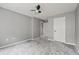 Gray carpeted bedroom with a closet and a view of the hallway at 2680 Pine Tree Ne Rd # 2, Atlanta, GA 30324