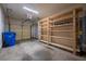 Spacious garage with ample storage, including custom shelving and room for parking at 2680 Pine Tree Ne Rd # 2, Atlanta, GA 30324