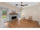 Cozy living room boasts a decorative fireplace, modern flooring and ample natural light at 2680 Pine Tree Ne Rd # 2, Atlanta, GA 30324