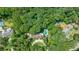 Expansive wooded property with a pool, tennis court, and stately home with circular drive at 510 Heards Ferry Rd, Atlanta, GA 30328