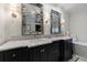 Stylish bathroom with dual vanities, marble countertops, and sophisticated lighting creating a spa-like atmosphere at 510 Heards Ferry Rd, Atlanta, GA 30328