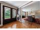 Elegant dining room with hardwood floors, fireplace and view to the exterior at 510 Heards Ferry Rd, Atlanta, GA 30328