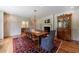 Well-appointed dining room with hardwood floors, chandelier, and classic decor at 510 Heards Ferry Rd, Atlanta, GA 30328