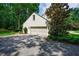 View of the detached two car garage of this property at 510 Heards Ferry Rd, Atlanta, GA 30328