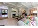 Bright and spacious living room with fireplace, built-in shelving, and stylish decor at 510 Heards Ferry Rd, Atlanta, GA 30328