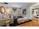 Cozy living room with plush seating, unique coffee table, and access to the bedroom at 510 Heards Ferry Rd, Atlanta, GA 30328