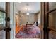 Office with hardwood floors, built-in shelving, and views through french doors at 510 Heards Ferry Rd, Atlanta, GA 30328