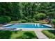 Relax in this beautiful in-ground pool with manicured landscaping at 510 Heards Ferry Rd, Atlanta, GA 30328