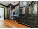 Spacious walk-in closet with custom cabinetry, mirrored accents, and zebra-print wallpaper for a luxurious feel at 510 Heards Ferry Rd, Atlanta, GA 30328