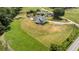 Scenic aerial shot of the house on a large lot, showcasing the expansive green lawns and mature trees at 5315 Hendrix Rd, Cumming, GA 30040