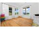 Bright bedroom with hardwood floors and scenic view from windows at 5315 Hendrix Rd, Cumming, GA 30040