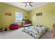 A vibrant ' bedroom with playful decor and carpet offers a fun and inviting space at 5315 Hendrix Rd, Cumming, GA 30040