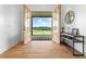 Beautiful entry featuring wood floors and an exterior view of acreage at 5315 Hendrix Rd, Cumming, GA 30040