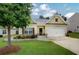 Charming one-story home with a well-manicured lawn and inviting curb appeal at 6470 Saint Mark Way, Fairburn, GA 30213
