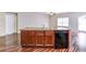 A kitchen island with a double sink and dishwasher at 6470 Saint Mark Way, Fairburn, GA 30213