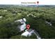 Aerial image features property nestled in lush greenery near Emory University with skyline view at 1120 Briarcliff Ne Rd # 5, Atlanta, GA 30306