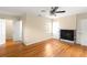 Bedroom featuring hardwood floors, a fireplace, and two closets at 1120 Briarcliff Ne Rd # 5, Atlanta, GA 30306