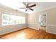 Open-concept dining room is enhanced by hardwood floors, natural light, and a ceiling fan at 1120 Briarcliff Ne Rd # 5, Atlanta, GA 30306