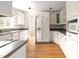 Bright kitchen with updated appliances, laminate countertops, hardwood floors, and ample cabinet space at 1120 Briarcliff Ne Rd # 5, Atlanta, GA 30306