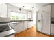 Bright kitchen with updated appliances, laminate countertops, hardwood floors, and plenty of storage at 1120 Briarcliff Ne Rd # 5, Atlanta, GA 30306