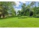Grassy backyard with garden at 2199 Clairmont Cir, Snellville, GA 30078