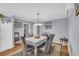 The dining room has neutral paint, hardwood floors, and decor at 2199 Clairmont Cir, Snellville, GA 30078