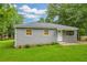 Charming single-story home with a well-maintained lawn and siding at 2199 Clairmont Cir, Snellville, GA 30078