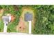 Aerial view of a home with a long driveway and a neighboring house with a car at 509 Grace Ln, Villa Rica, GA 30180