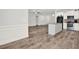 Open-concept kitchen with stainless steel appliances and a center island at 509 Grace Ln, Villa Rica, GA 30180