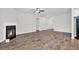 Spacious living room features a fireplace and hardwood floors at 509 Grace Ln, Villa Rica, GA 30180