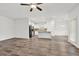 Bright, open-concept space featuring sleek flooring, a central island, and modern lighting fixtures at 509 Grace Ln, Villa Rica, GA 30180
