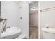 This bathroom features a sleek vanity with a modern sink and opens to the bedroom at 637 Carlouetta Sw Rd, Mableton, GA 30126