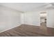 Open living room features hardwood floors, neutral paint and opens to kitchen at 637 Carlouetta Sw Rd, Mableton, GA 30126