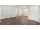Bright living room showcasing hardwood flooring, a ceiling fan, and a white front door at 637 Carlouetta Sw Rd, Mableton, GA 30126