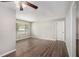 Comfortable living room with hardwood floors, a ceiling fan, and an abundance of natural light at 637 Carlouetta Sw Rd, Mableton, GA 30126