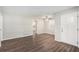 Open living room features hardwood floors, neutral paint, and lots of natural light at 637 Carlouetta Sw Rd, Mableton, GA 30126