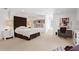 A spacious bedroom with an accent wall as a headboard and an office desk at 1016 Old Powers Ferry Rd, Atlanta, GA 30327